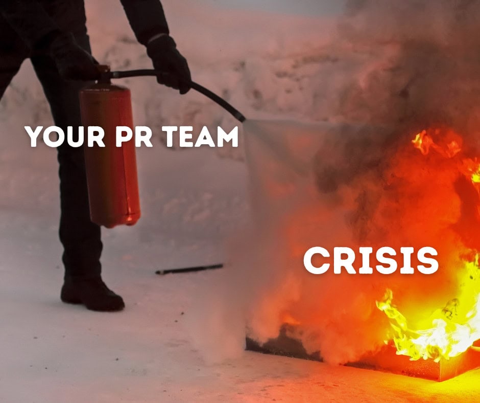 Back of a caera screen showing a journalist with a mic